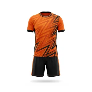 Spenix Sports Wear orange and black soccer uniform with modern zig-zag pattern on jersey and matching black shorts